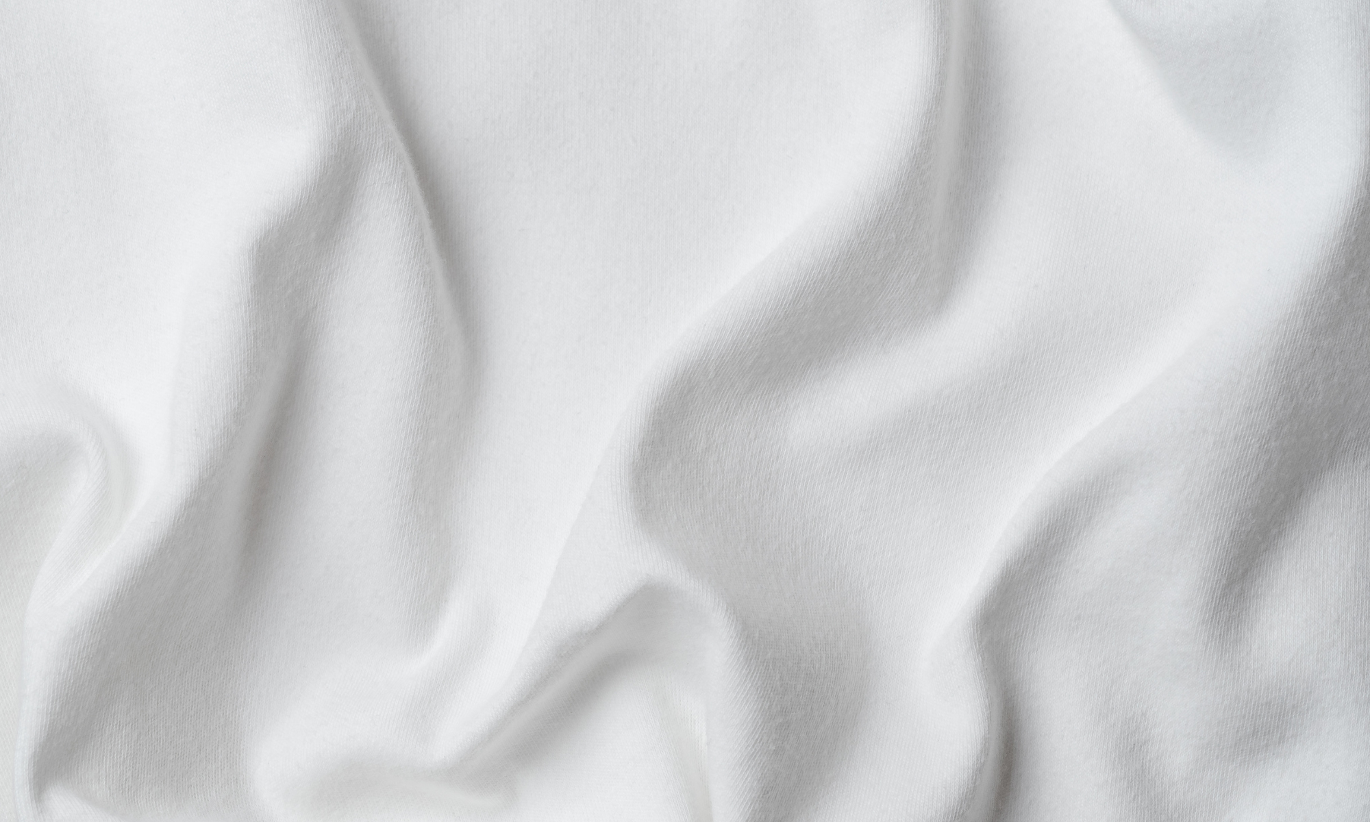 Close-up of white fabric with folds
