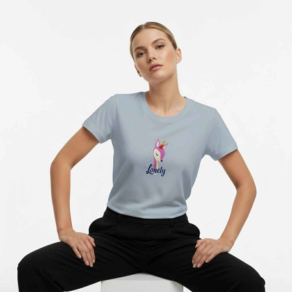 Woman wearing a light blue t-shirt with a unicorn graphic and 'Lovely' text on a white background