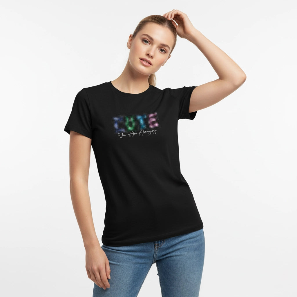 Woman wearing a black t-shirt with colorful text on a white background