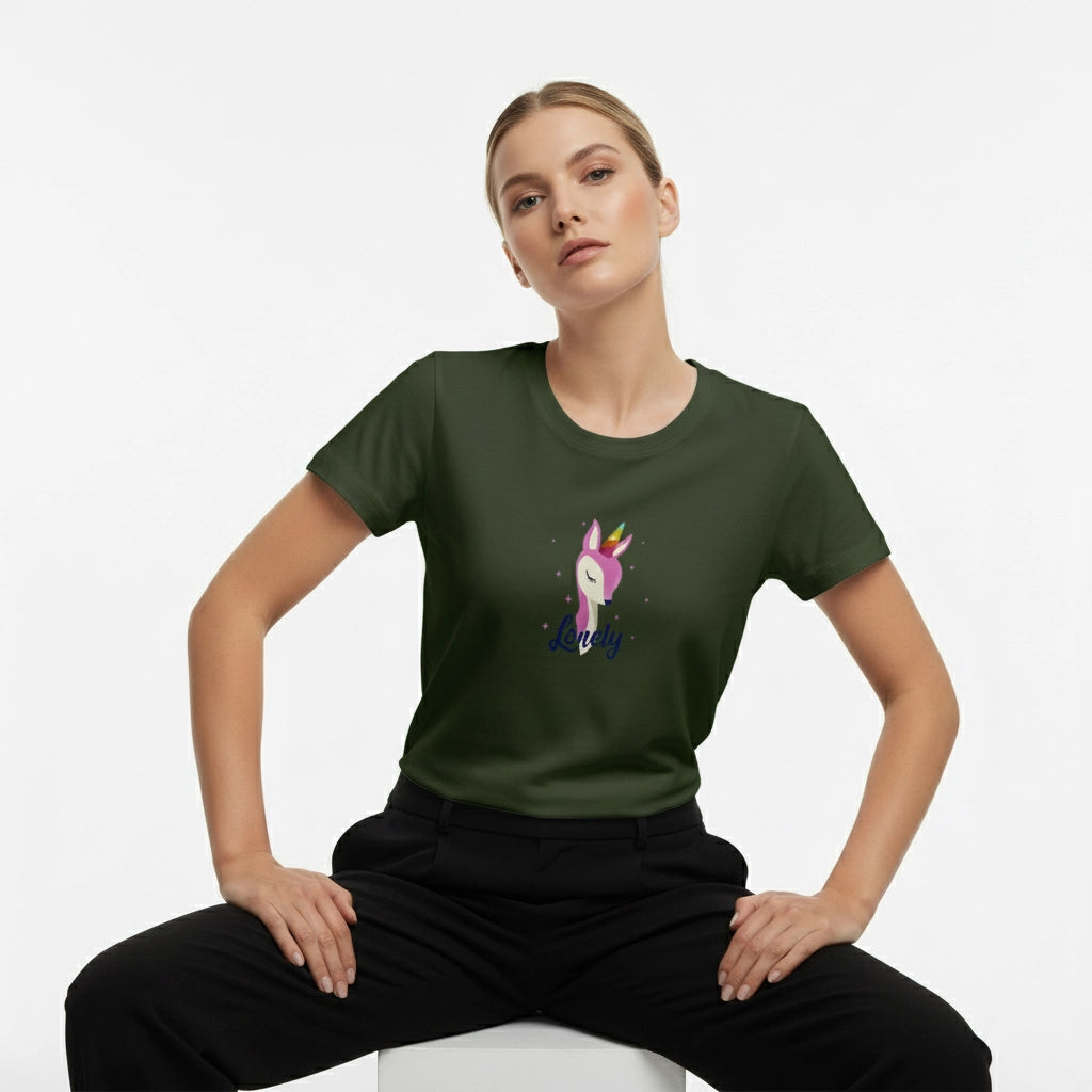 Woman wearing a green t-shirt with a unicorn design on a white background