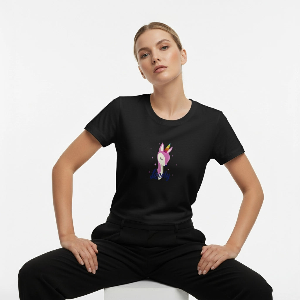 Person wearing a black t-shirt with a colorful unicorn design on a white background