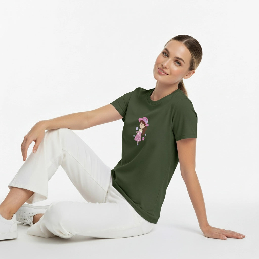 Woman wearing a green t-shirt with a graphic design on a white background