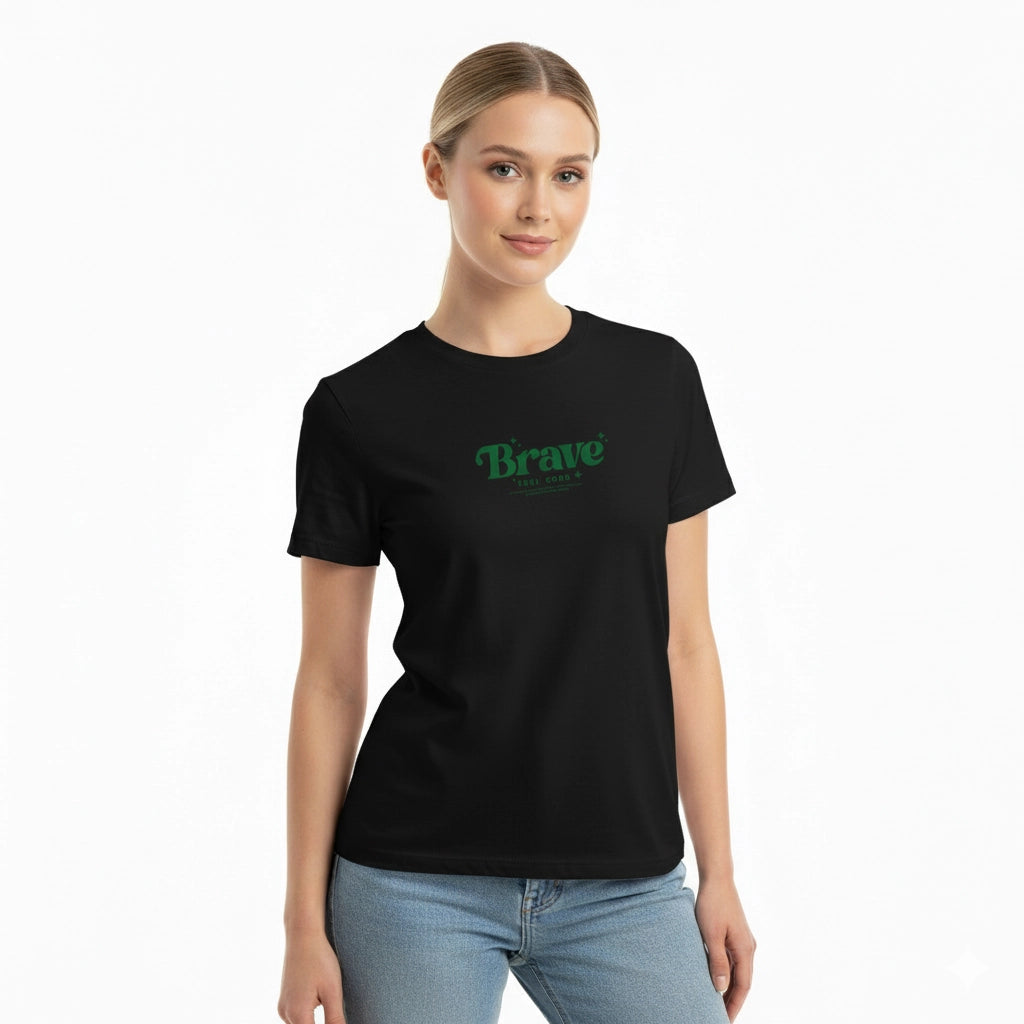 Woman wearing a black t-shirt with 'Brave' printed on it against a white background