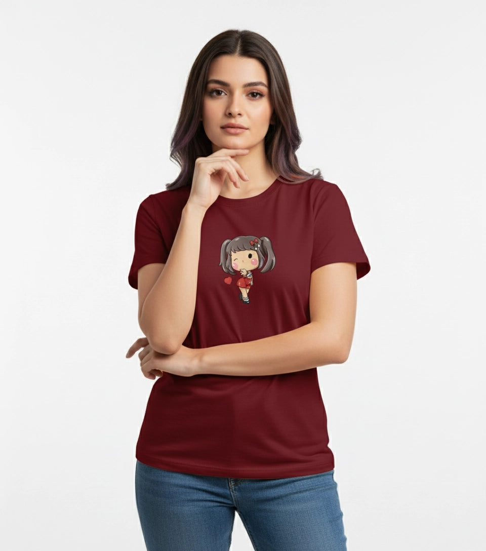 Woman wearing a maroon t-shirt with a graphic design on a white background