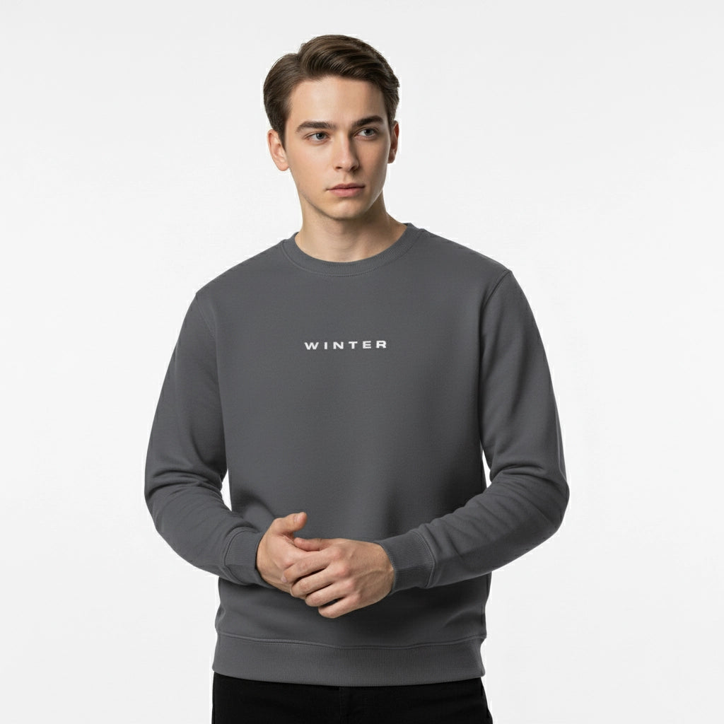 Man wearing a gray sweatshirt with 'WINTER' text on a white background