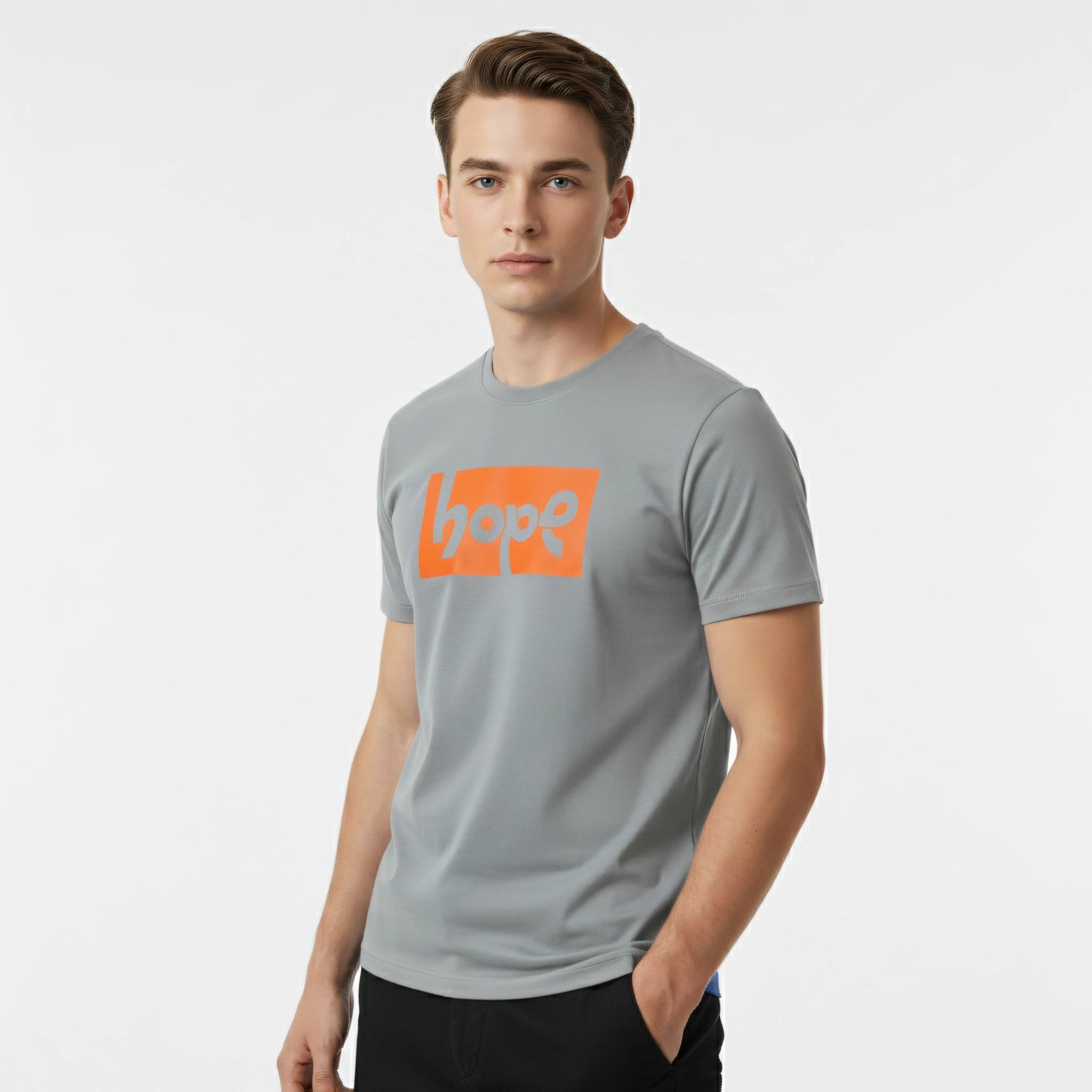 Man wearing a gray t-shirt with an orange 'Hope' logo on a light gray background