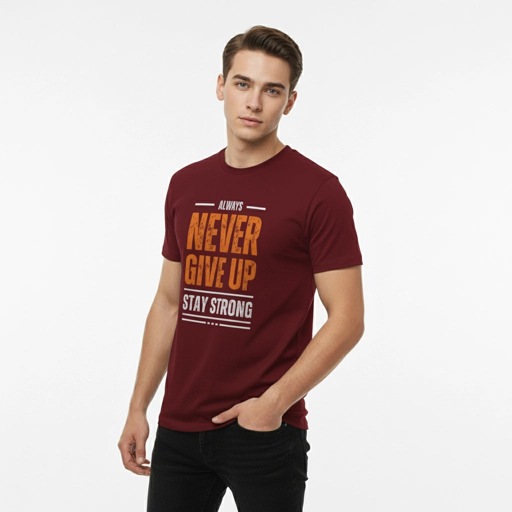 Man wearing a maroon t-shirt with motivational text on a white background