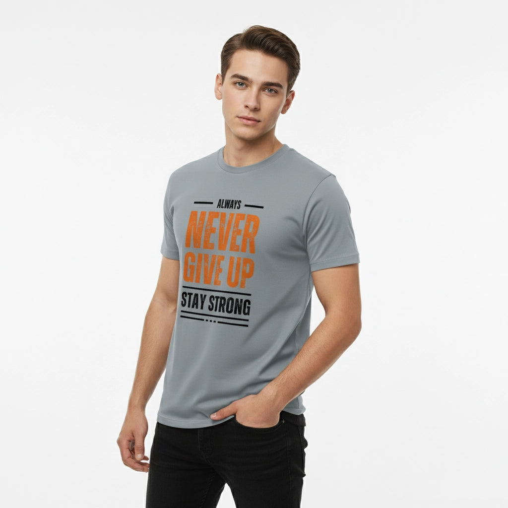 Man wearing a gray t-shirt with motivational text on a white background
