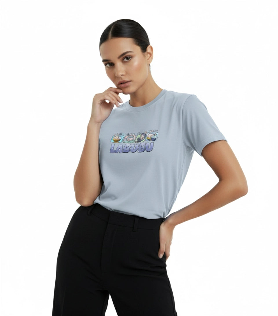 Woman wearing a light blue t-shirt with colorful text design on a white background