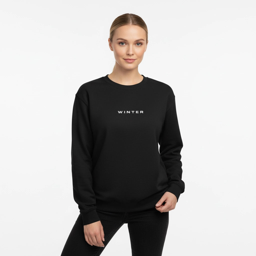 Person wearing a black sweatshirt with 'WINTER' text on a white background