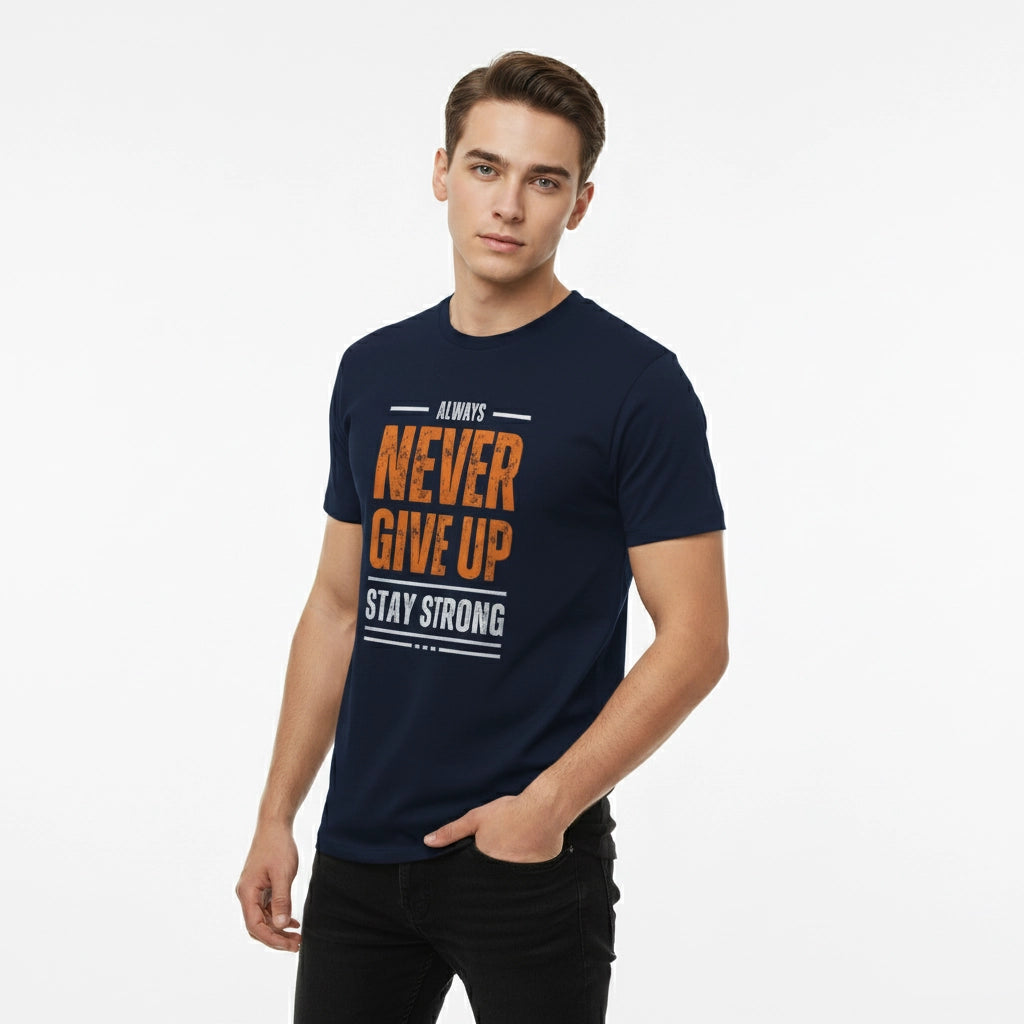 Man wearing a navy blue t-shirt with motivational text on a white background