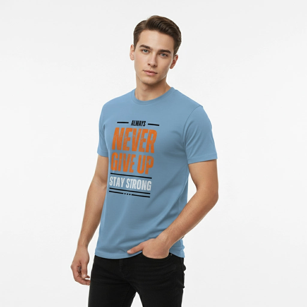 Man wearing a blue t-shirt with motivational text on a white background