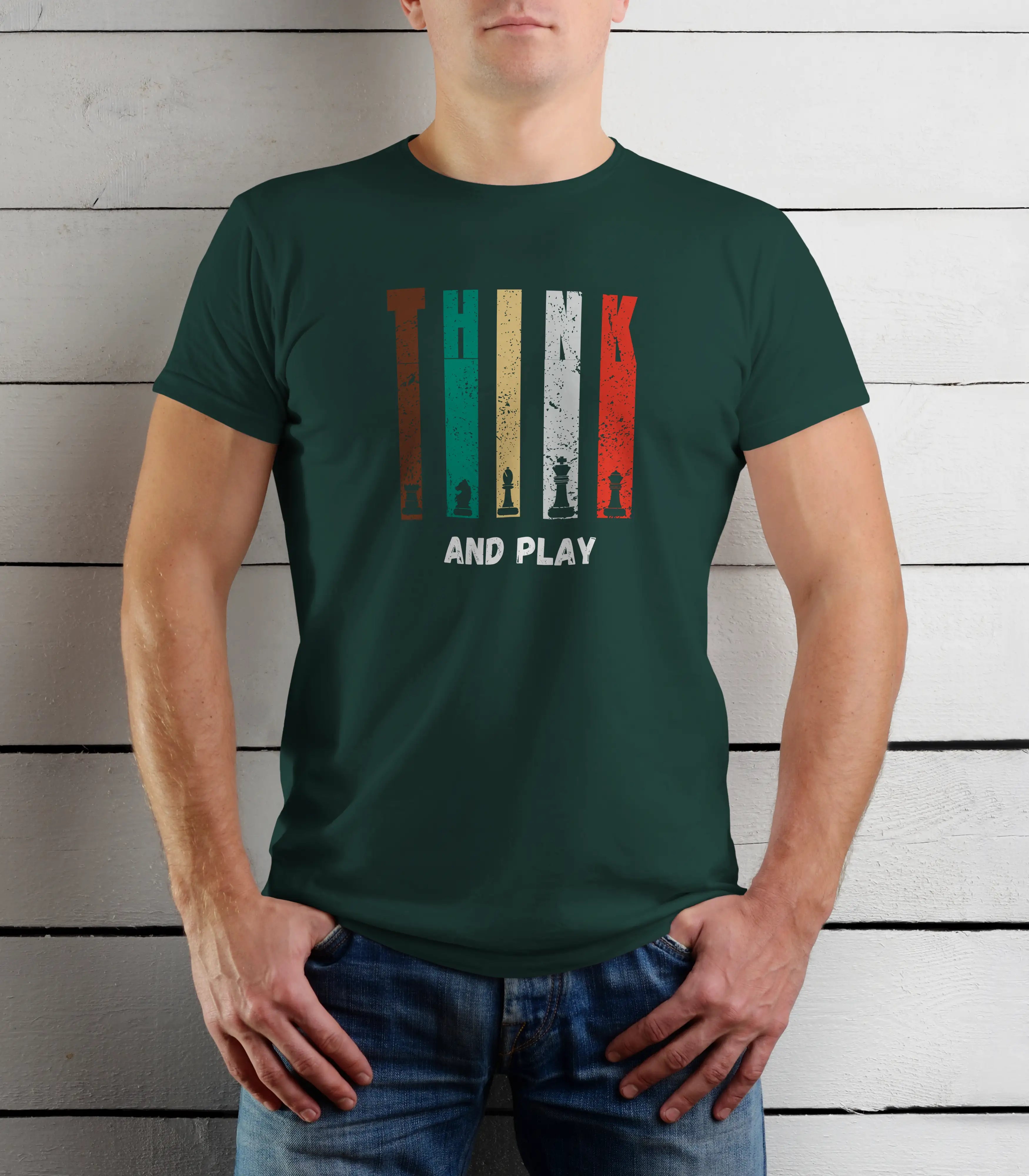 Person wearing a green t-shirt with a graphic design and text against a wooden background