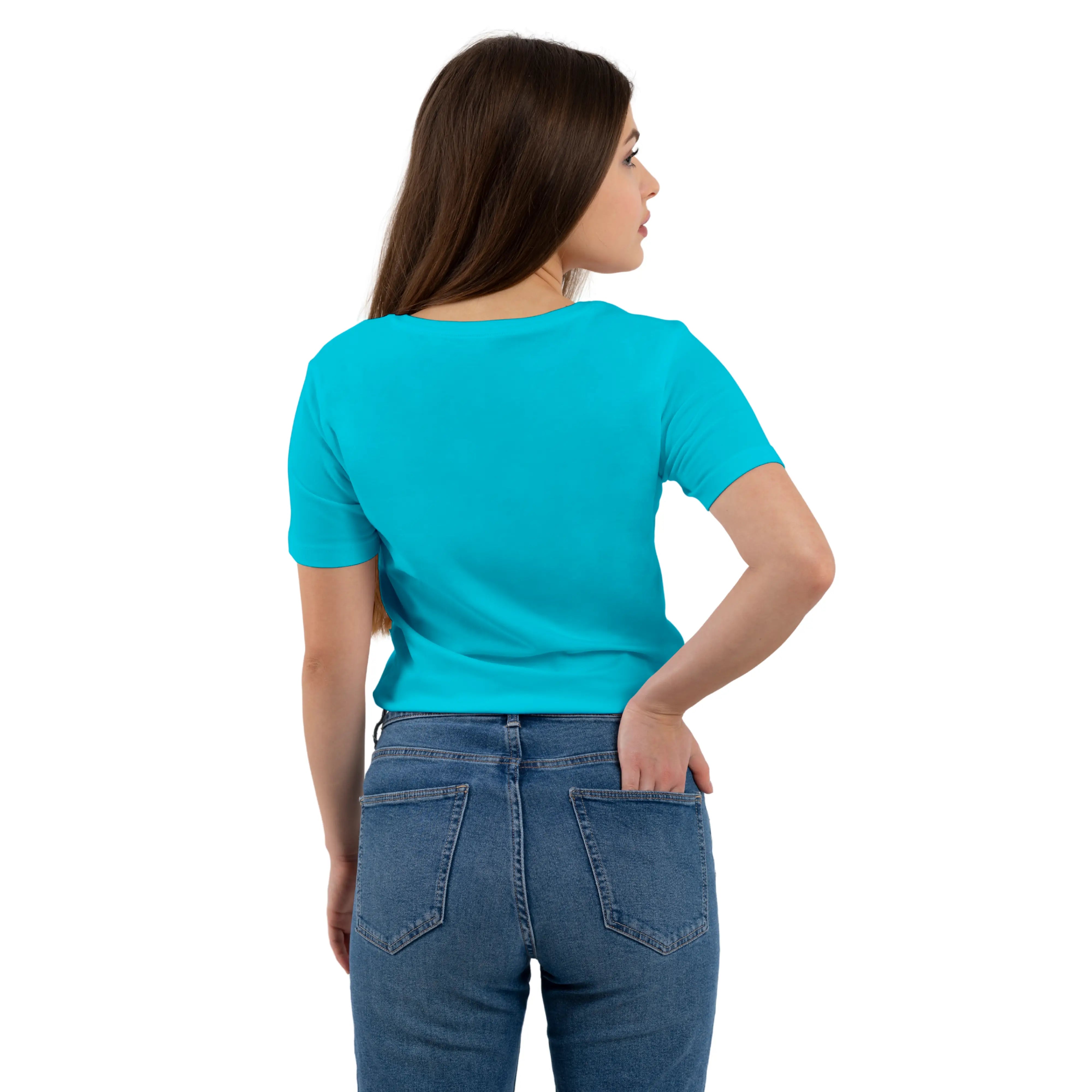 Woman wearing a turquoise shirt and blue jeans on a white background