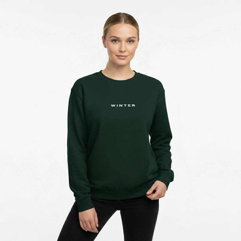 Person wearing a dark green sweatshirt with 'WINTER' text on a white background