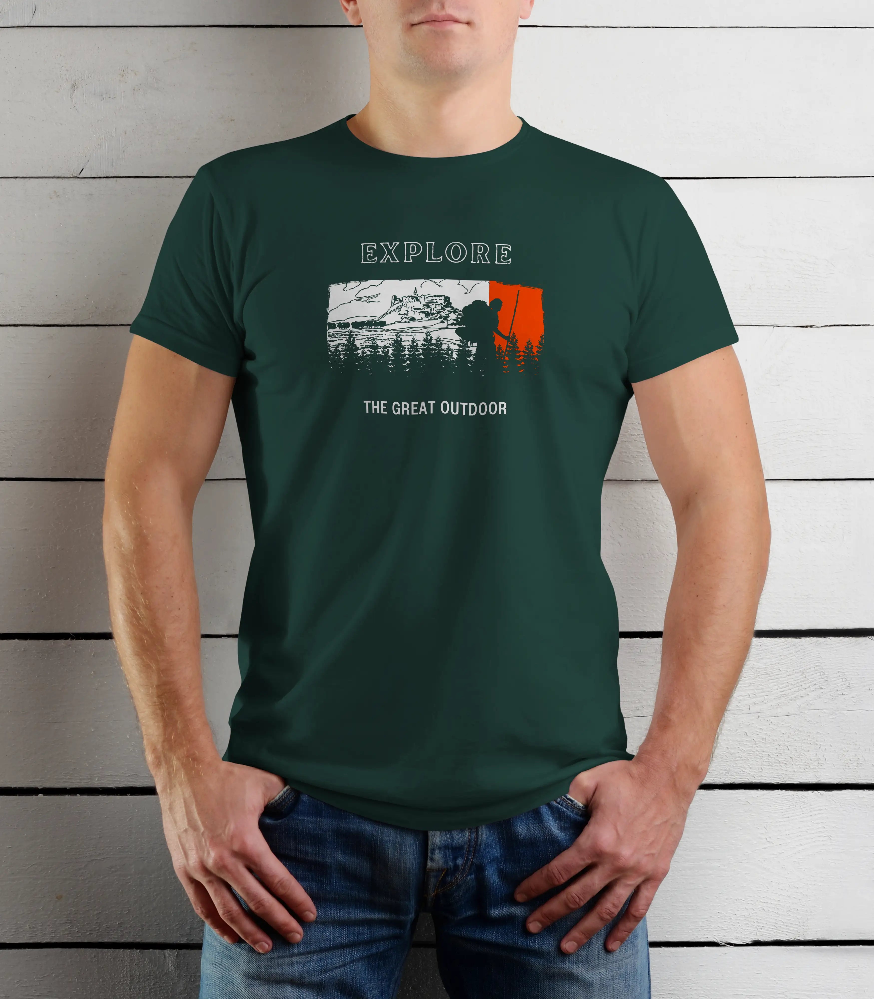 Person wearing a green t-shirt with outdoor-themed graphic and text.
