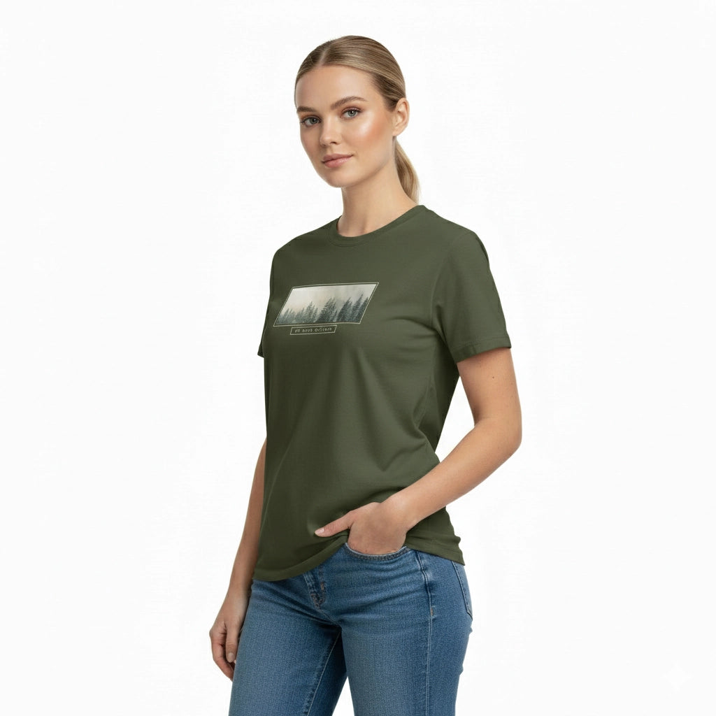 Woman wearing a green t-shirt with a graphic design on a white background