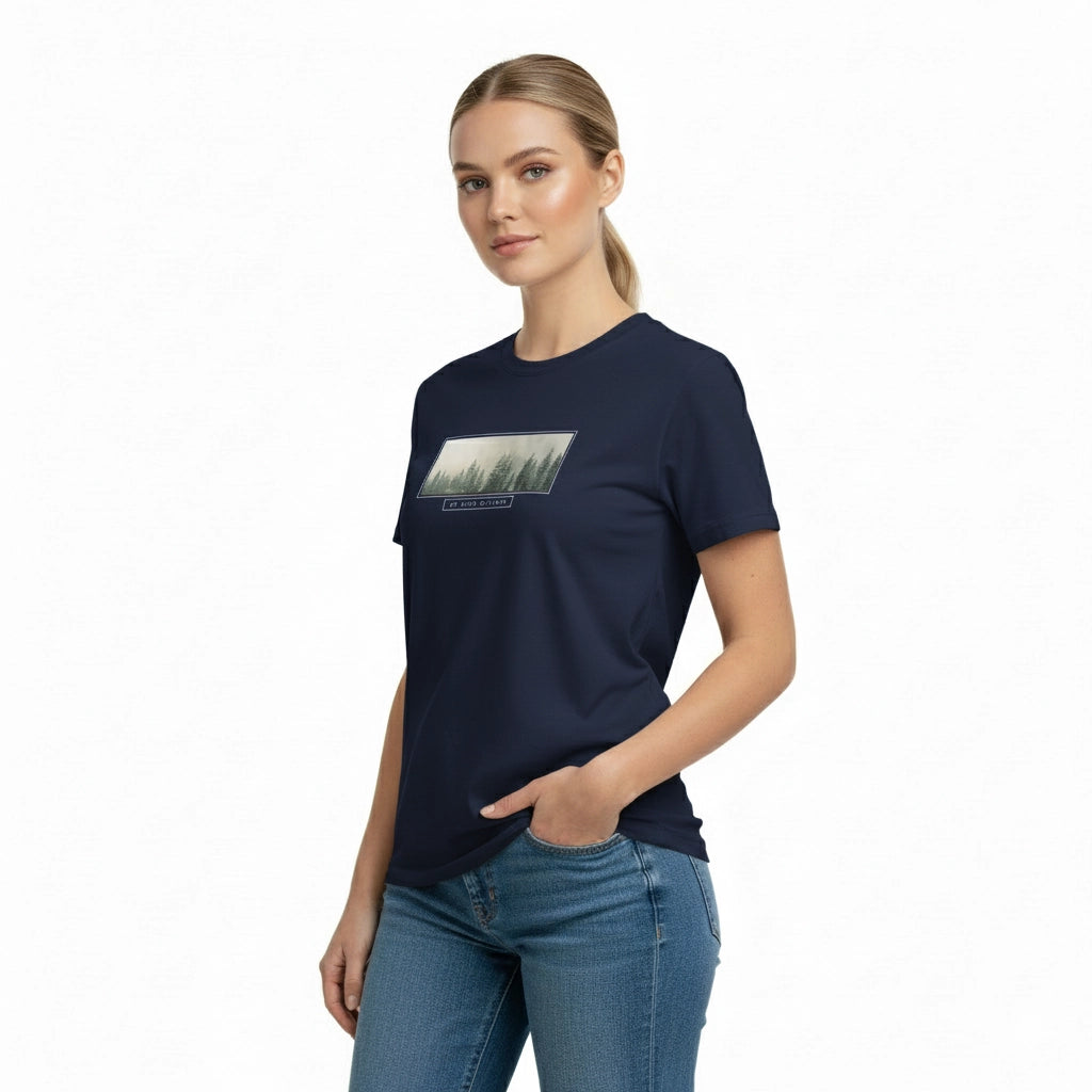 Woman wearing a navy blue t-shirt with a graphic design on a white background