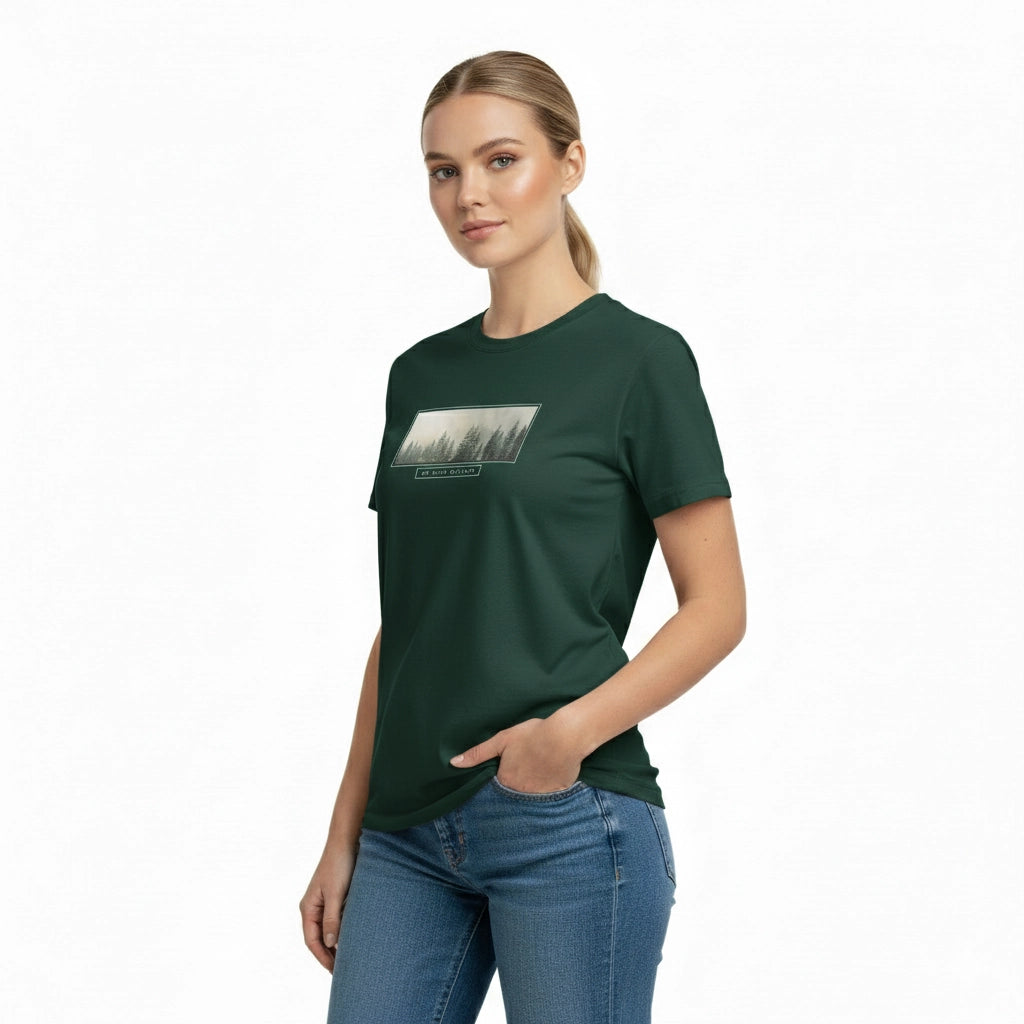 Woman wearing a green t-shirt with a graphic design on a white background