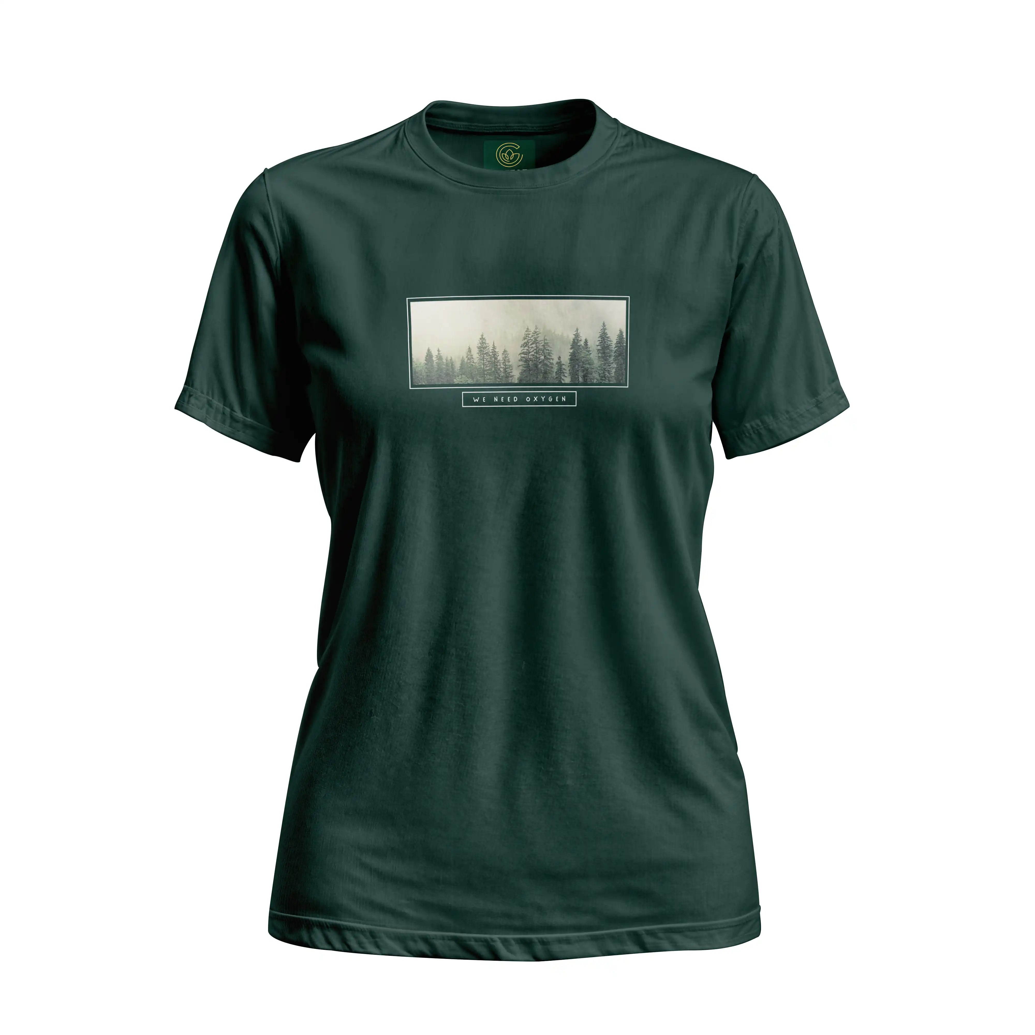 Green t-shirt with a forest graphic on a white background