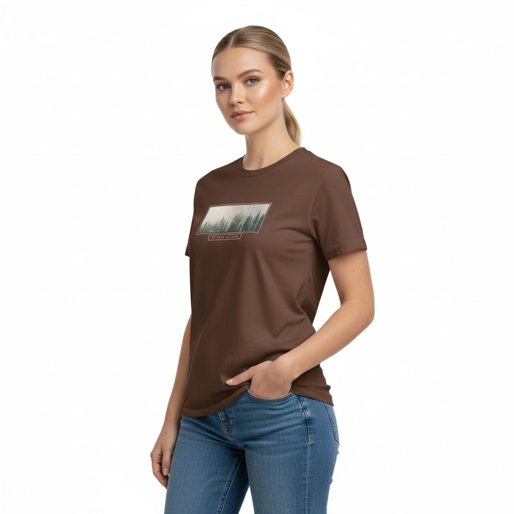Woman wearing a brown t-shirt with a graphic design on a white background