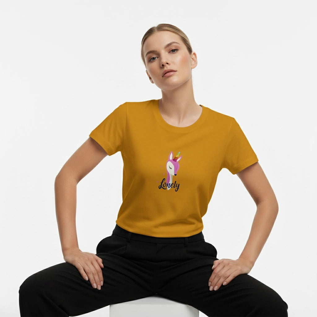 Woman wearing a mustard yellow t-shirt with a unicorn graphic and 'Lovely' text on a white background