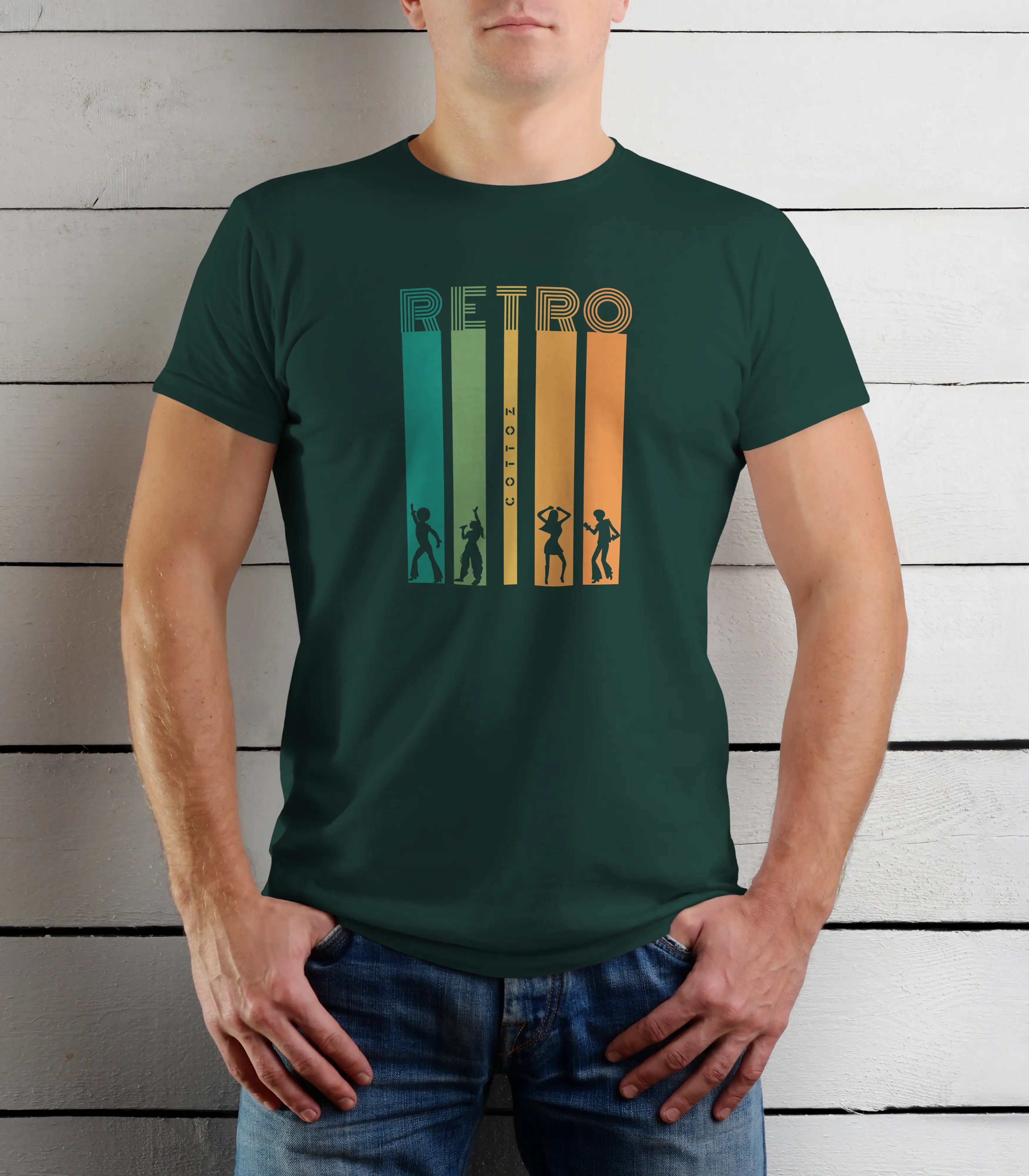 Person wearing a green t-shirt with a retro design against a wooden background
