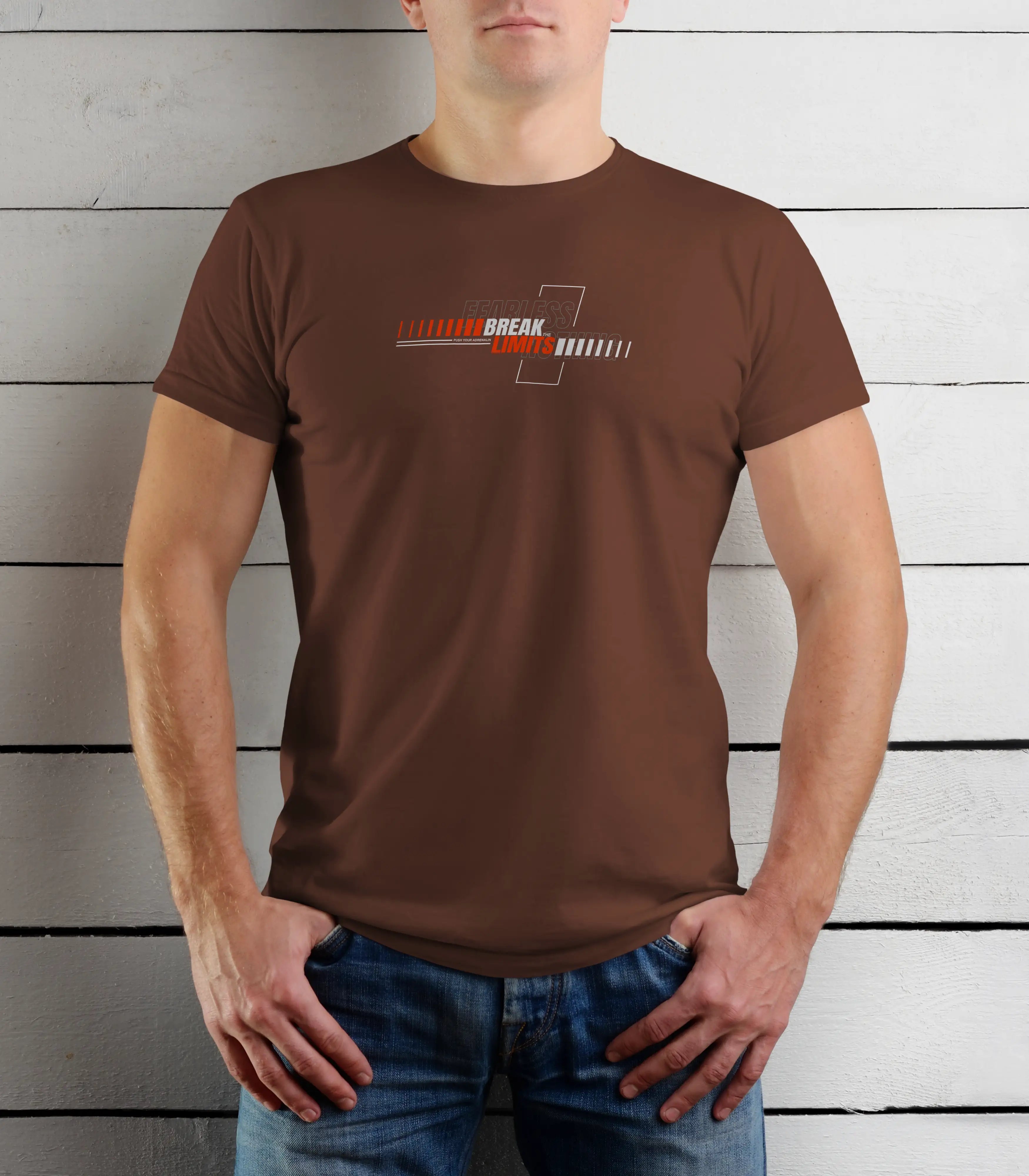 Person wearing a brown t-shirt with a logo against a wooden background
