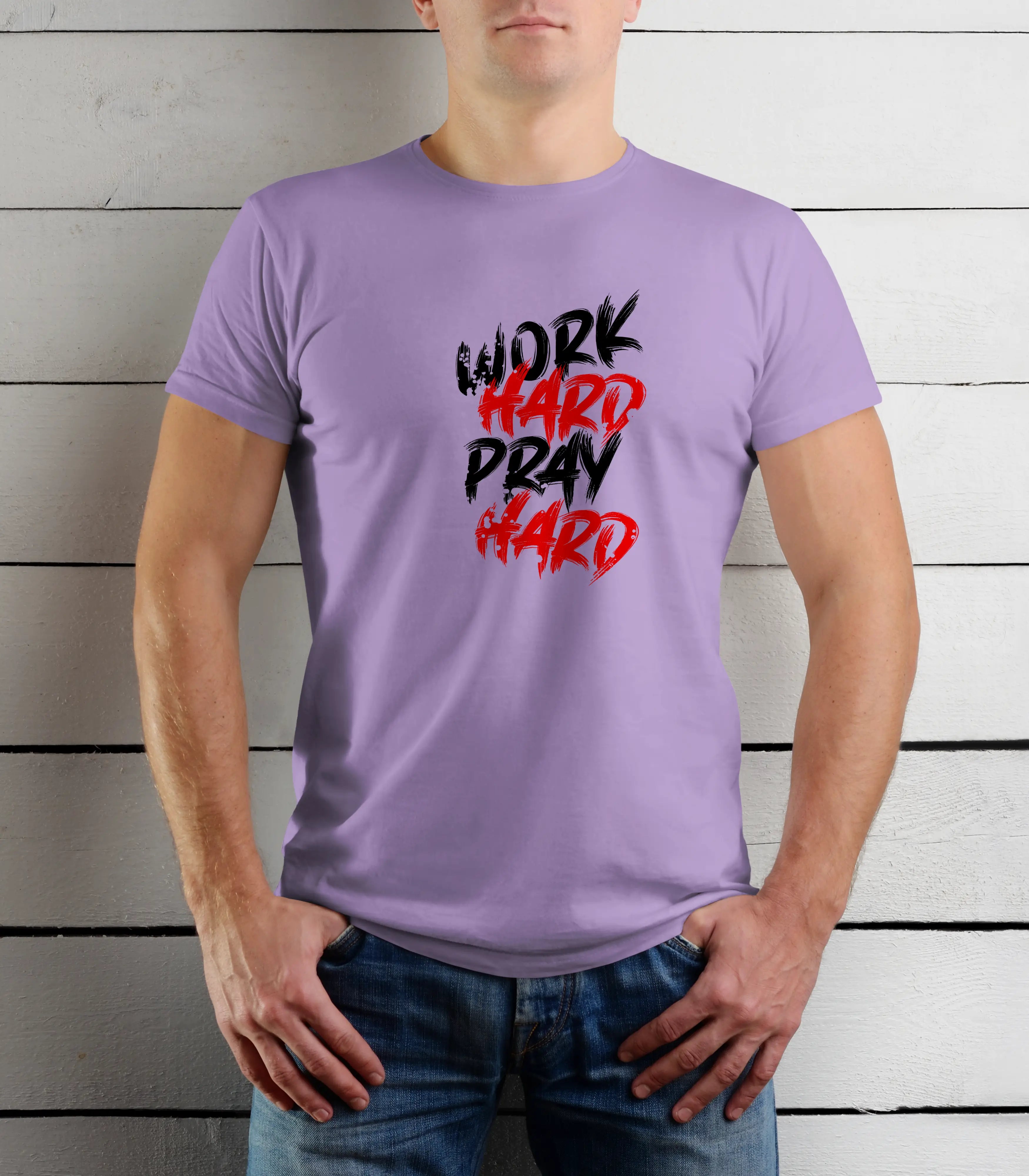 Person wearing a purple t-shirt with 'Work Hard Pray Hard' text on a wooden background