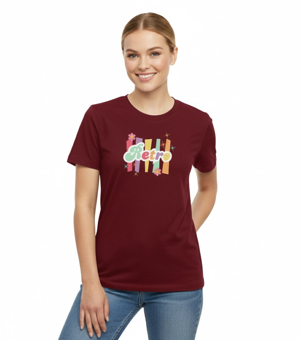 Woman wearing a maroon t-shirt with colorful 'Retro' design on a white background