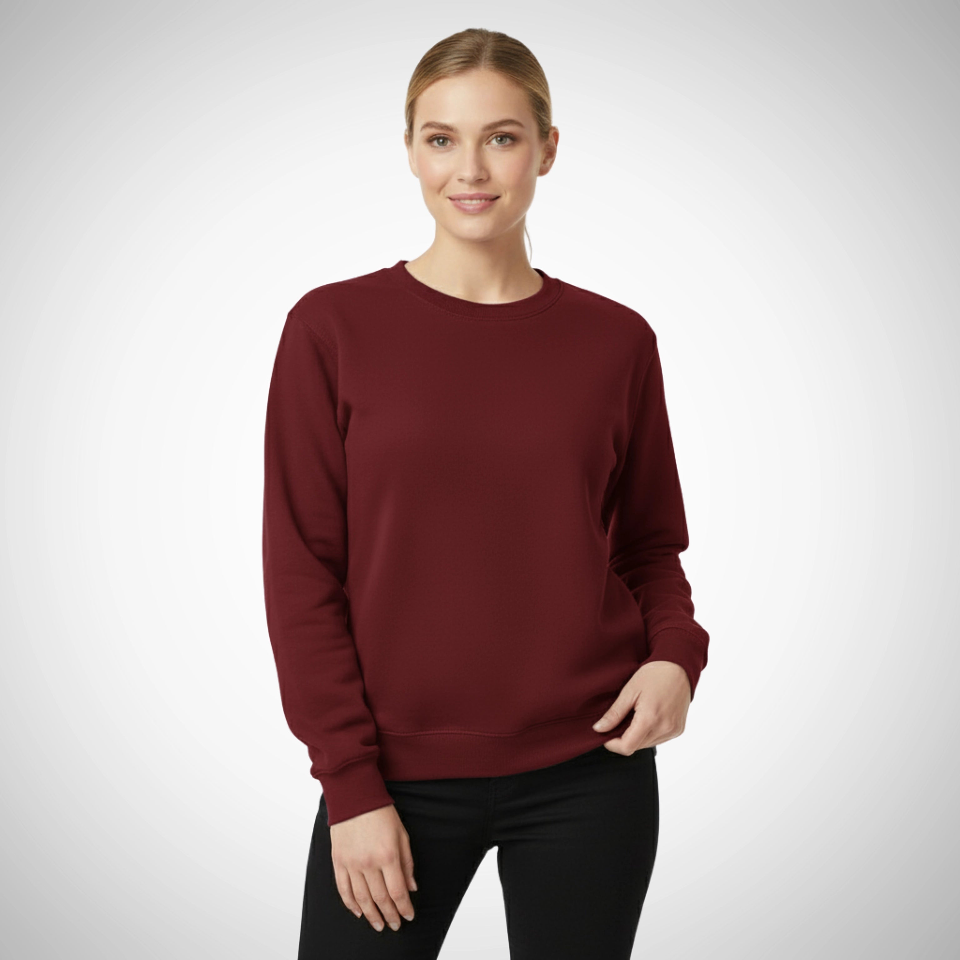 Woman wearing a maroon sweatshirt on a white background