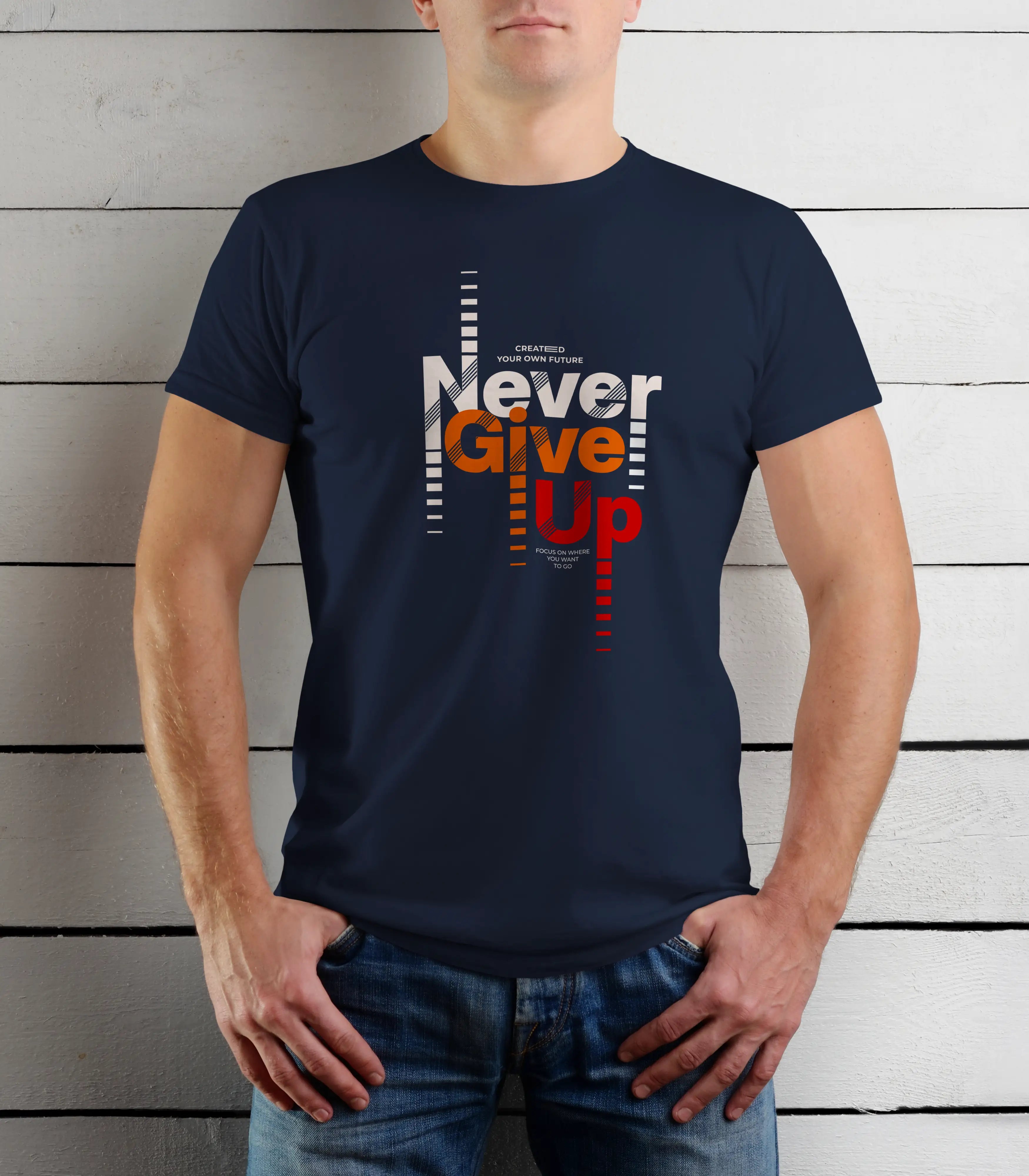 Person wearing a navy blue t-shirt with 'Never Give Up' text design against a wooden background
