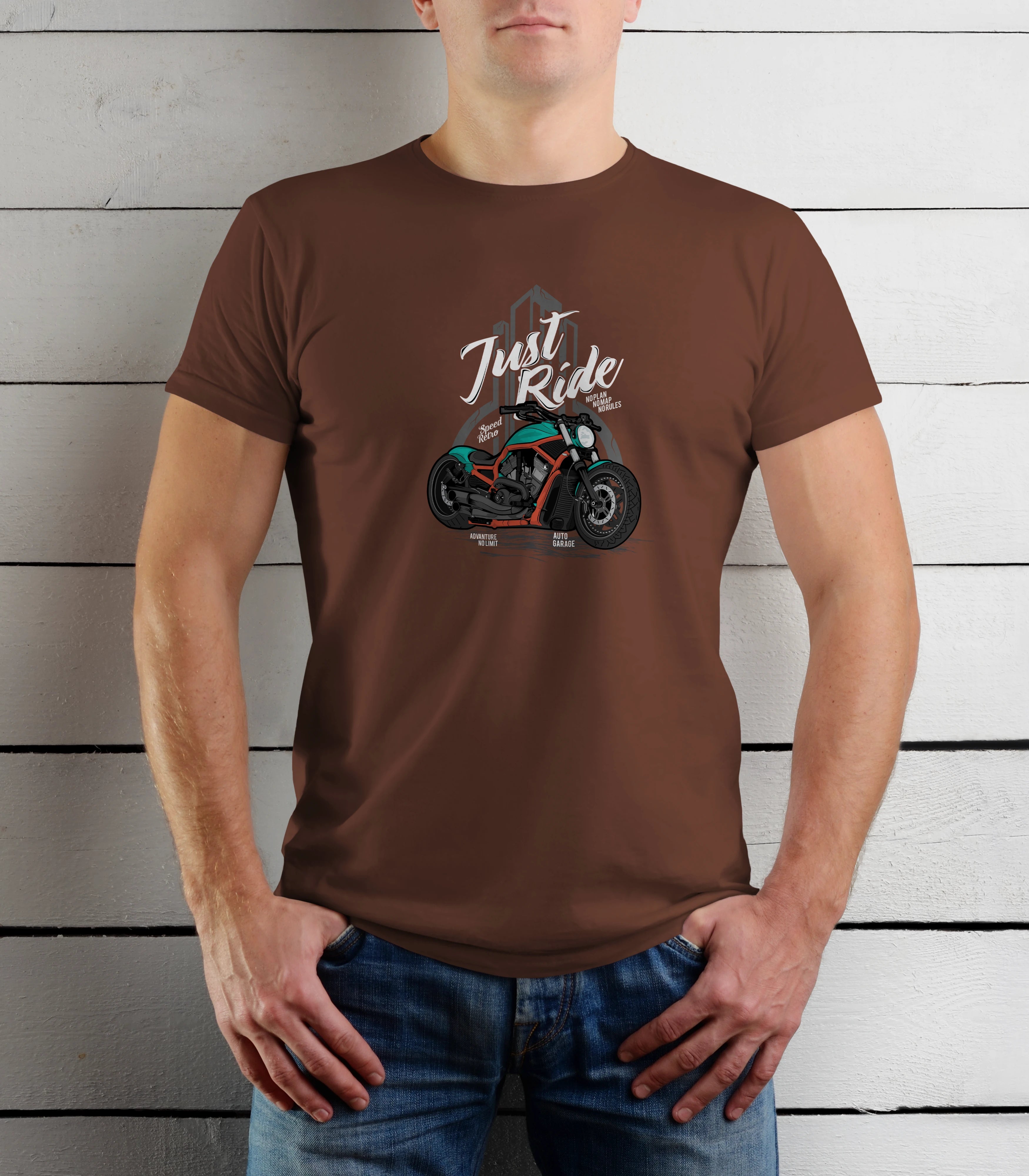 Person wearing a brown t-shirt with a motorcycle graphic and 'Just Ride' text against a wooden background
