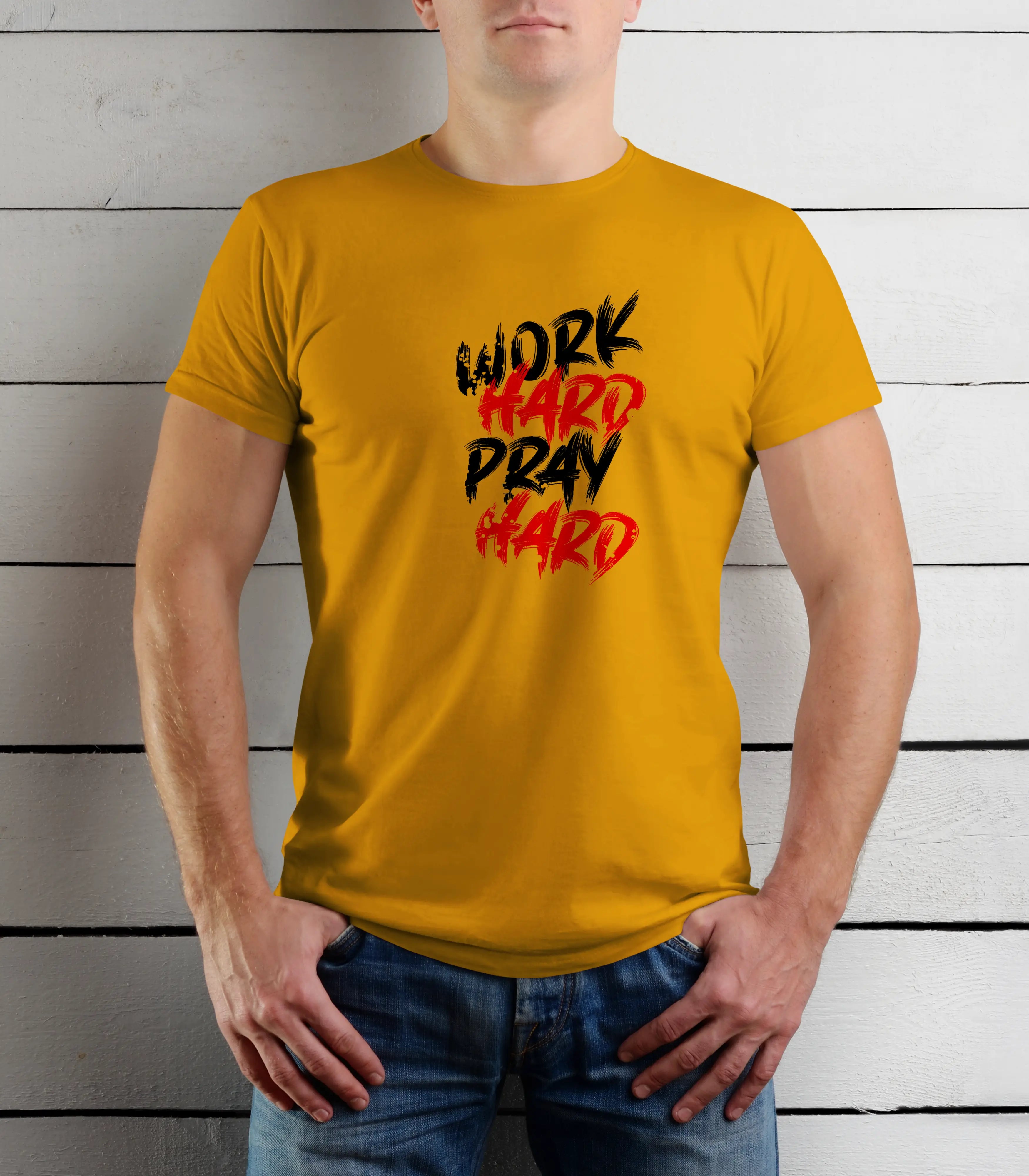 Person wearing a yellow t-shirt with 'Work Hard, Pray Hard' text against a wooden background
