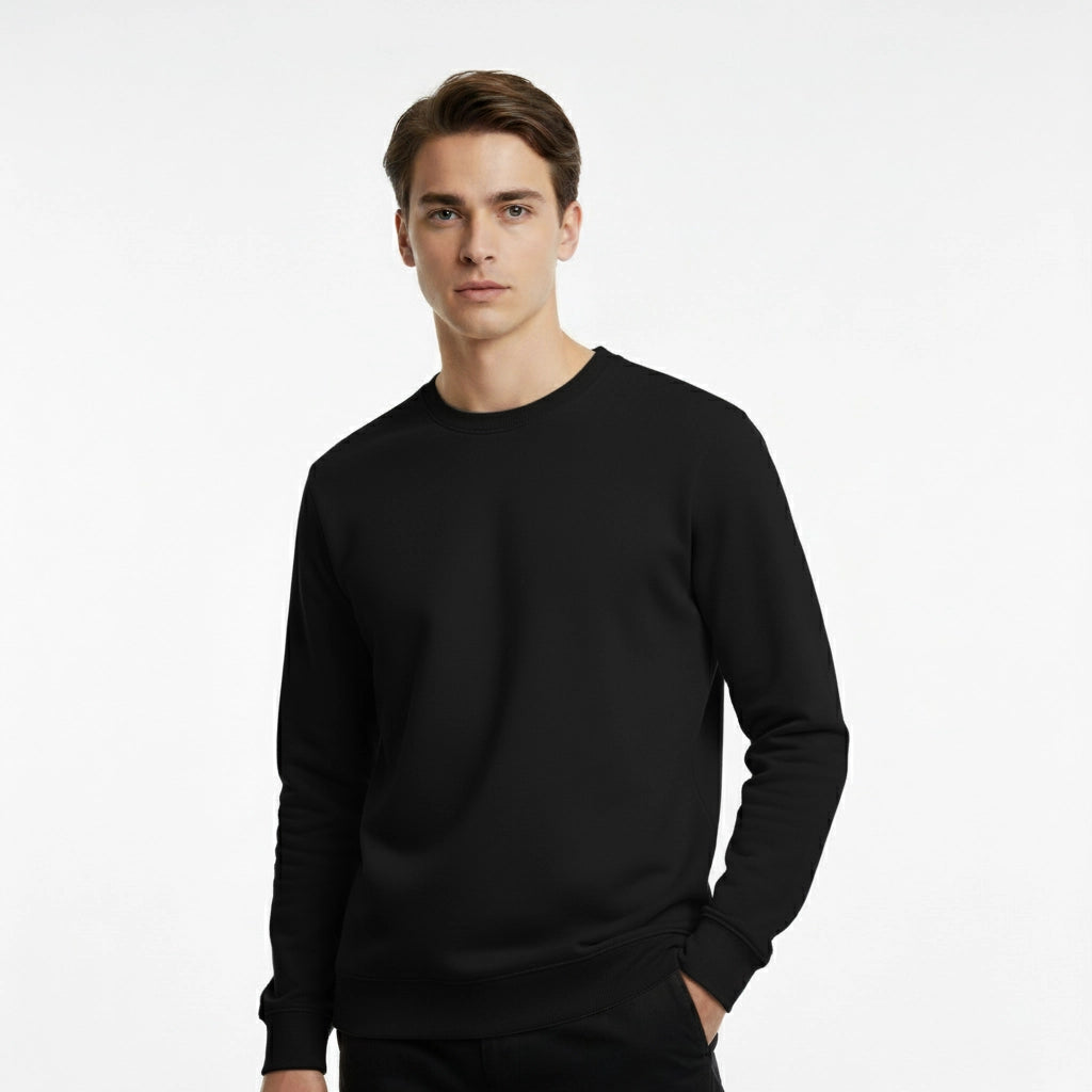 Man wearing a black sweater on a white background