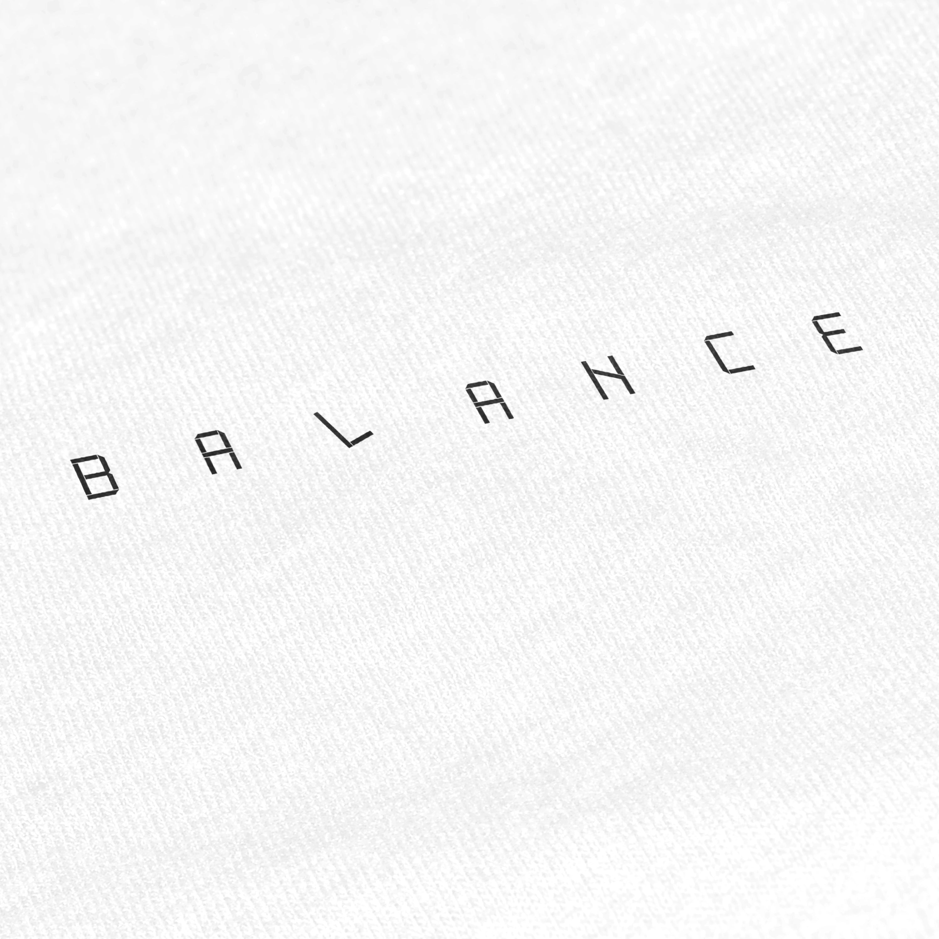 Text 'BALANCE' on a white background