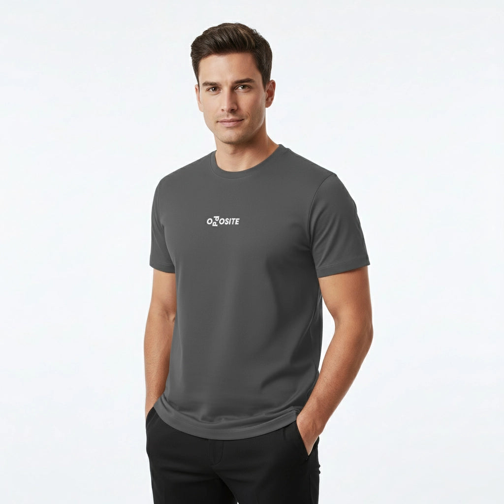 Man wearing a gray t-shirt with a logo on a white background