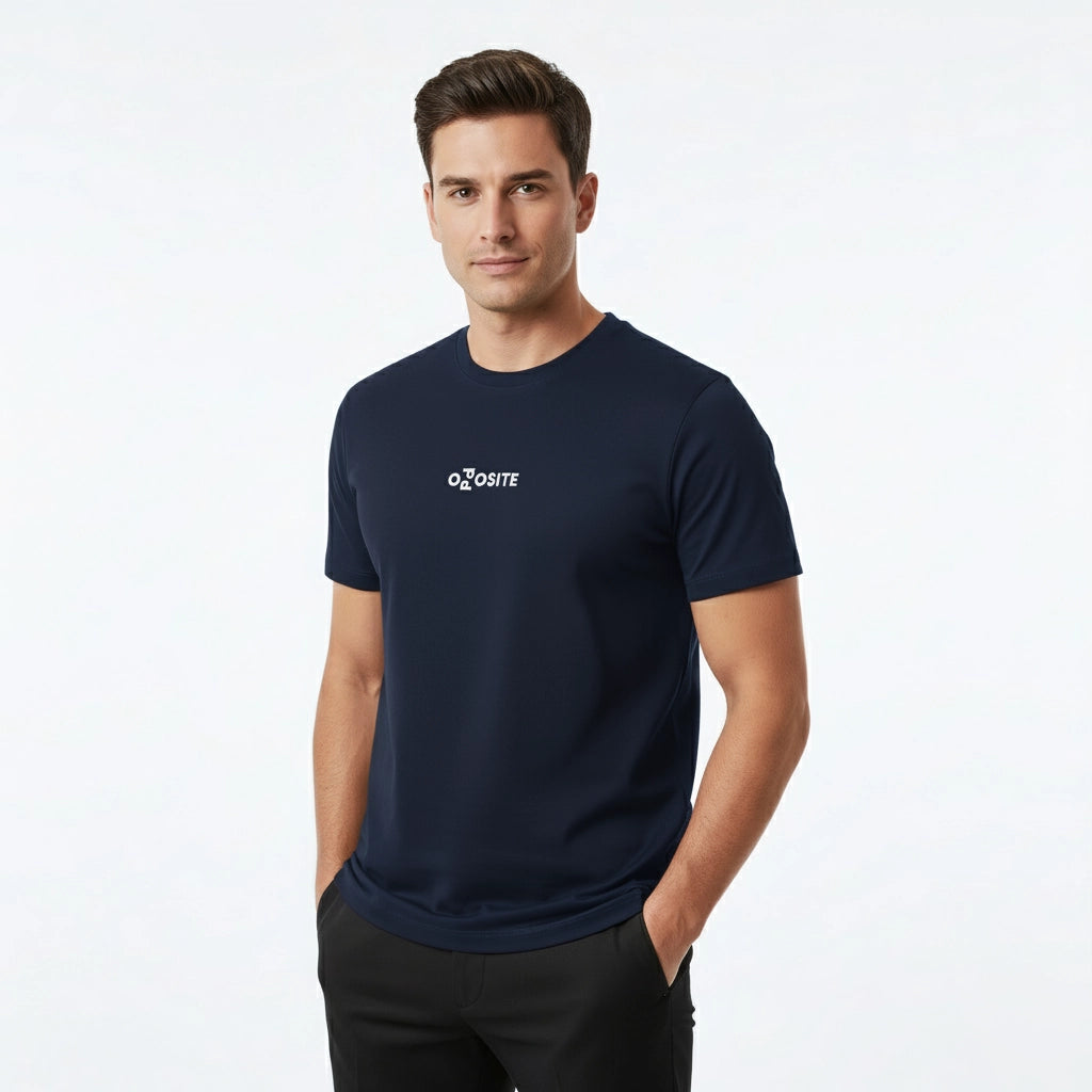 Man wearing a navy blue t-shirt with a logo on a white background