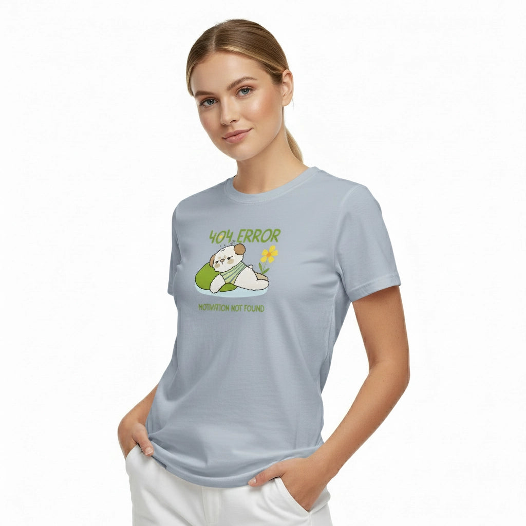 Woman wearing a light blue t-shirt with a graphic design on a white background