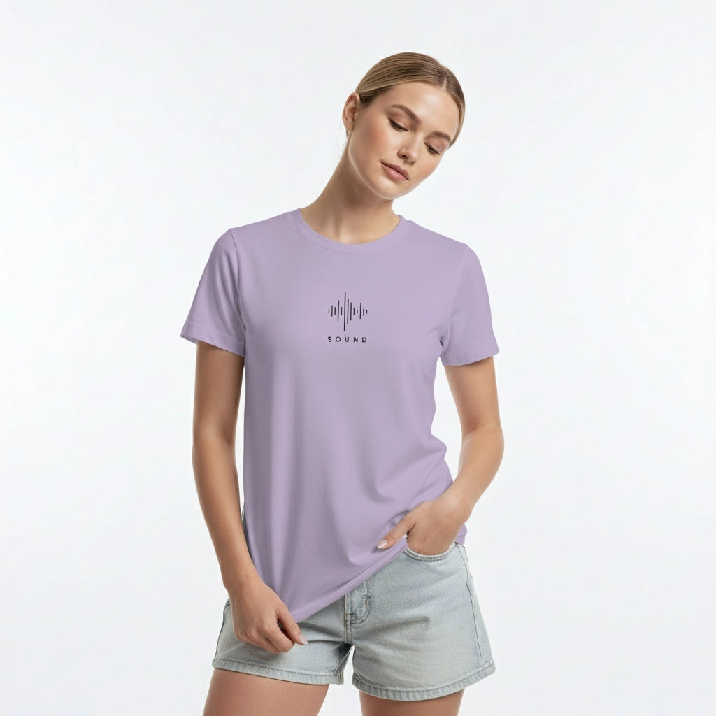 Woman wearing a light purple t-shirt with a graphic design on a white background