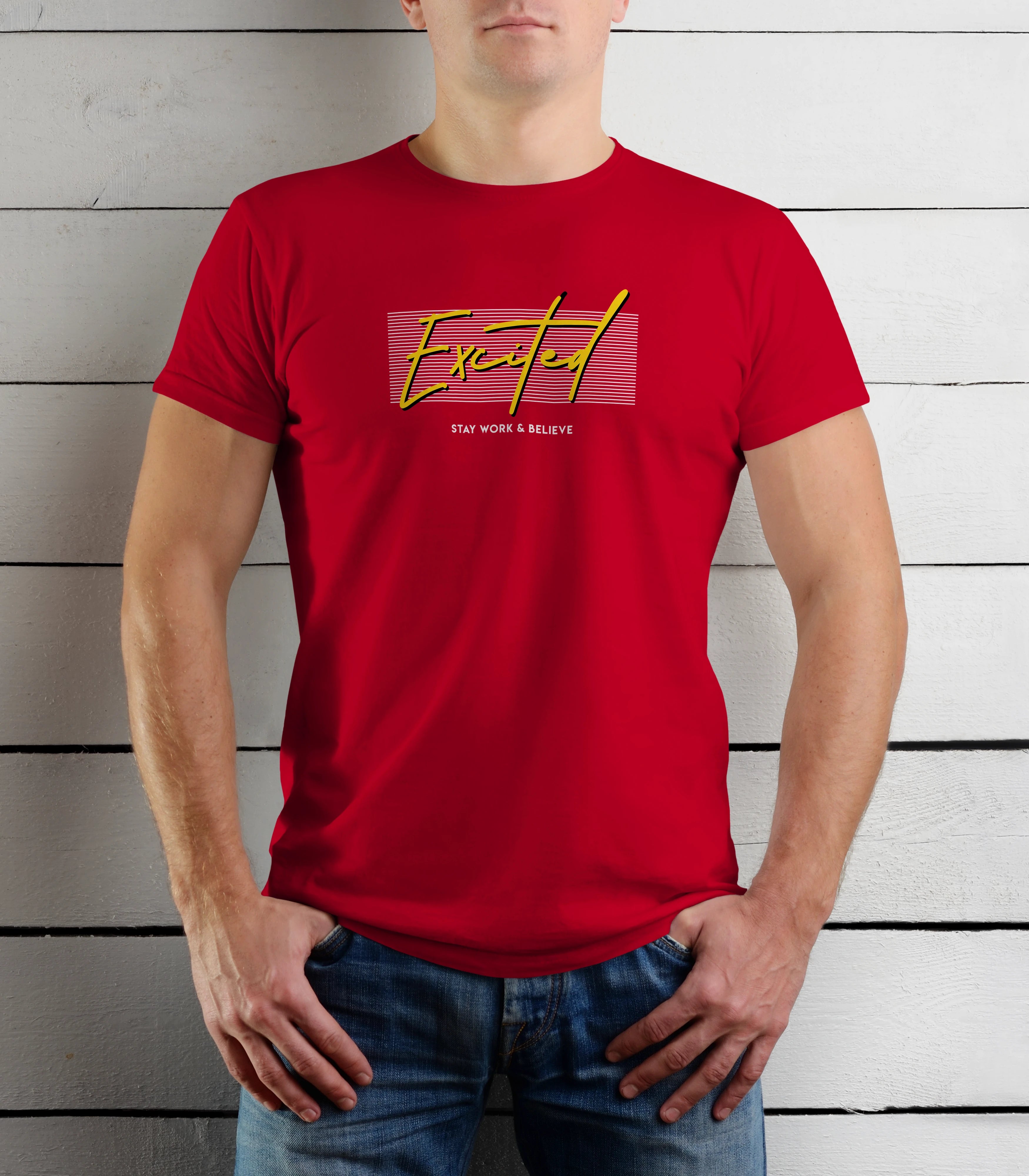 Person wearing a red t-shirt with yellow text against a wooden background