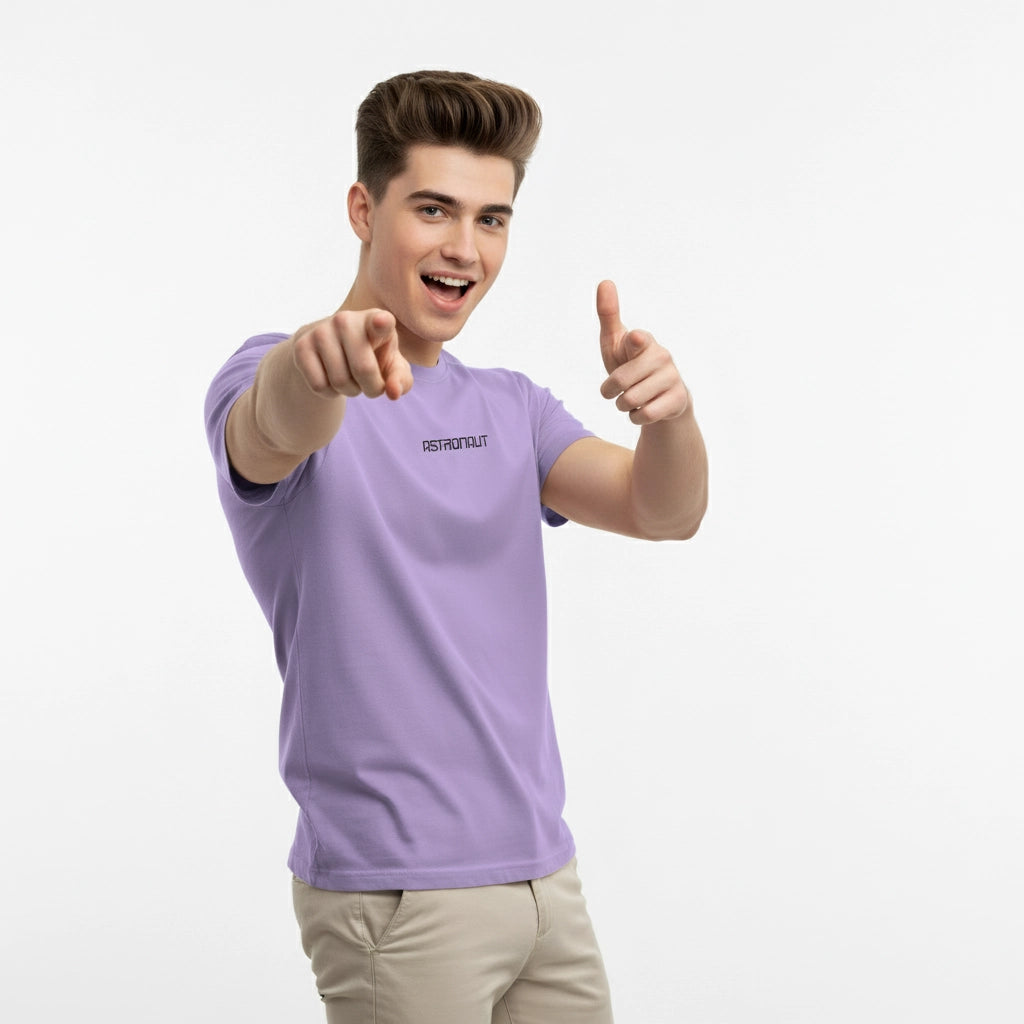 Person wearing a purple t-shirt with a logo, pointing forward on a white background