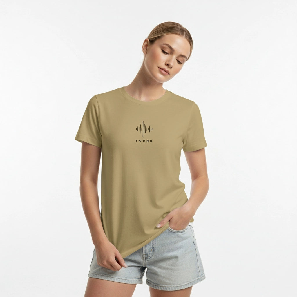 Woman wearing a beige t-shirt with a graphic design on a white background