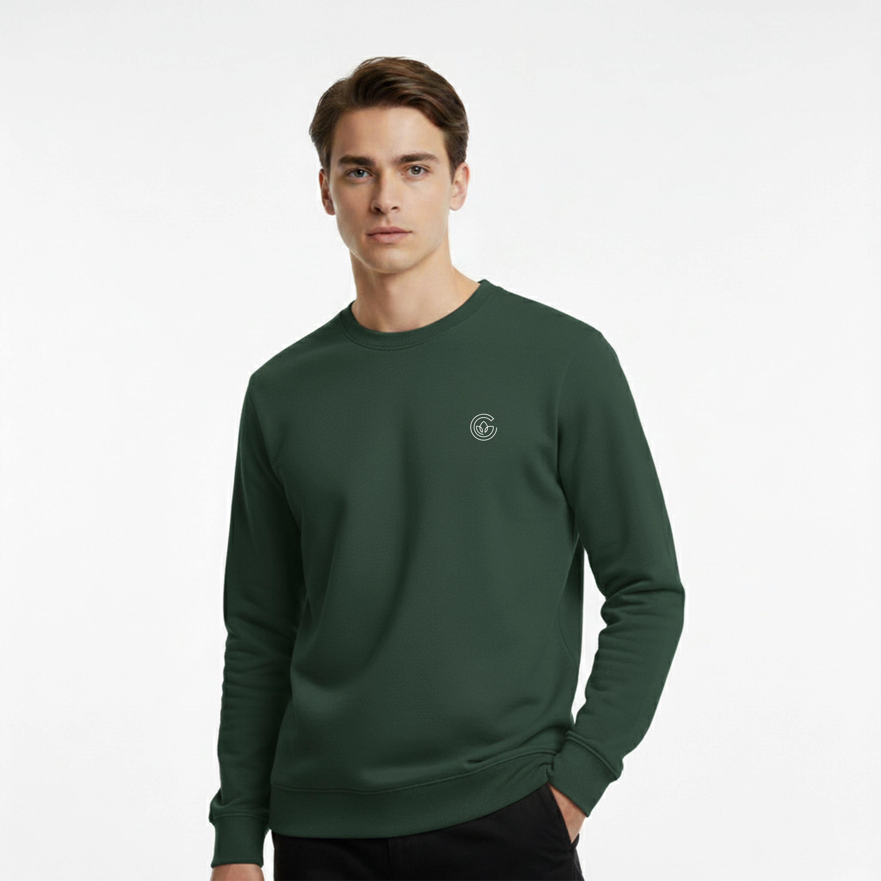 Man wearing a green sweatshirt with a small logo on a white background