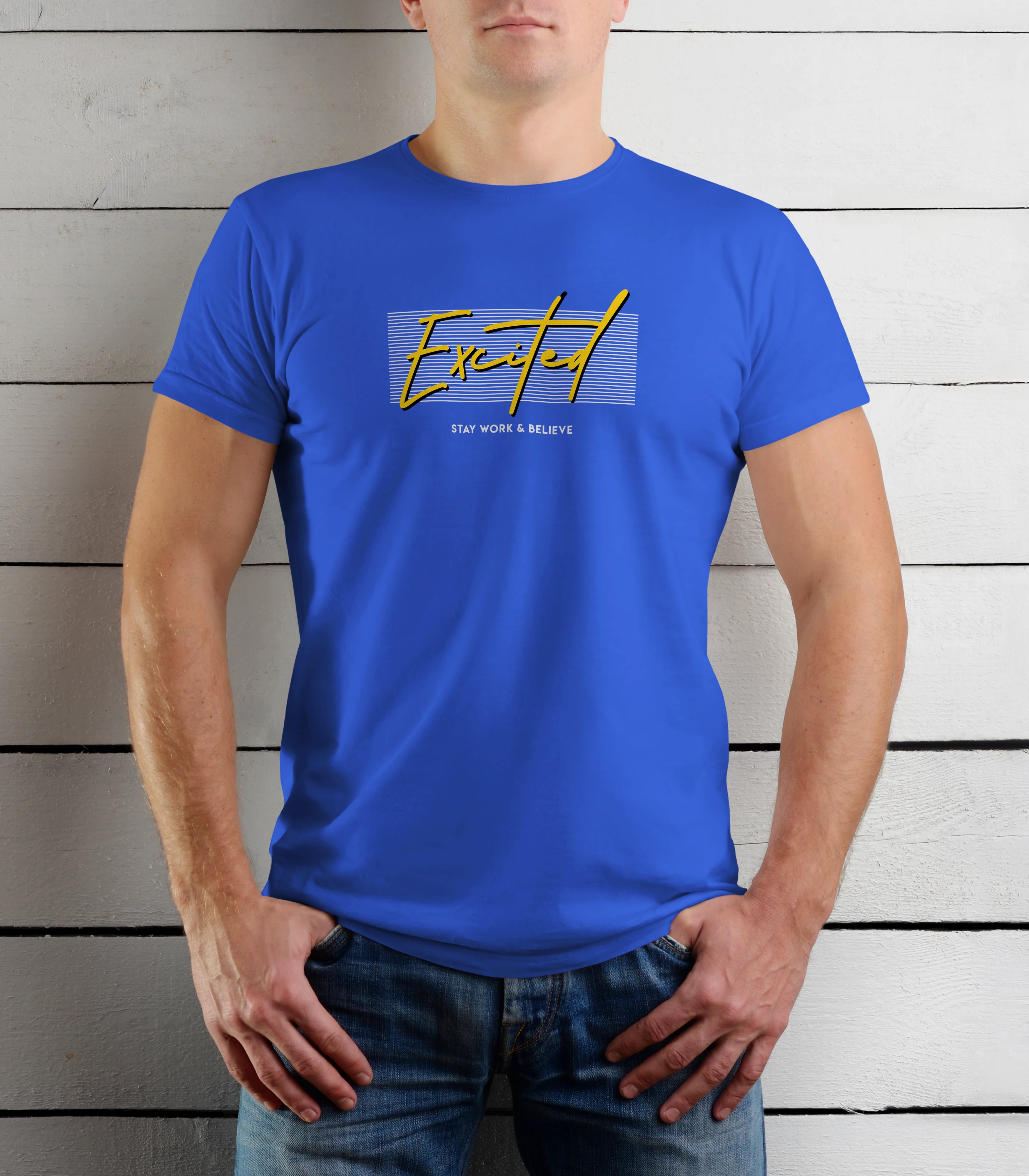 Person wearing a blue t-shirt with yellow text against a wooden background