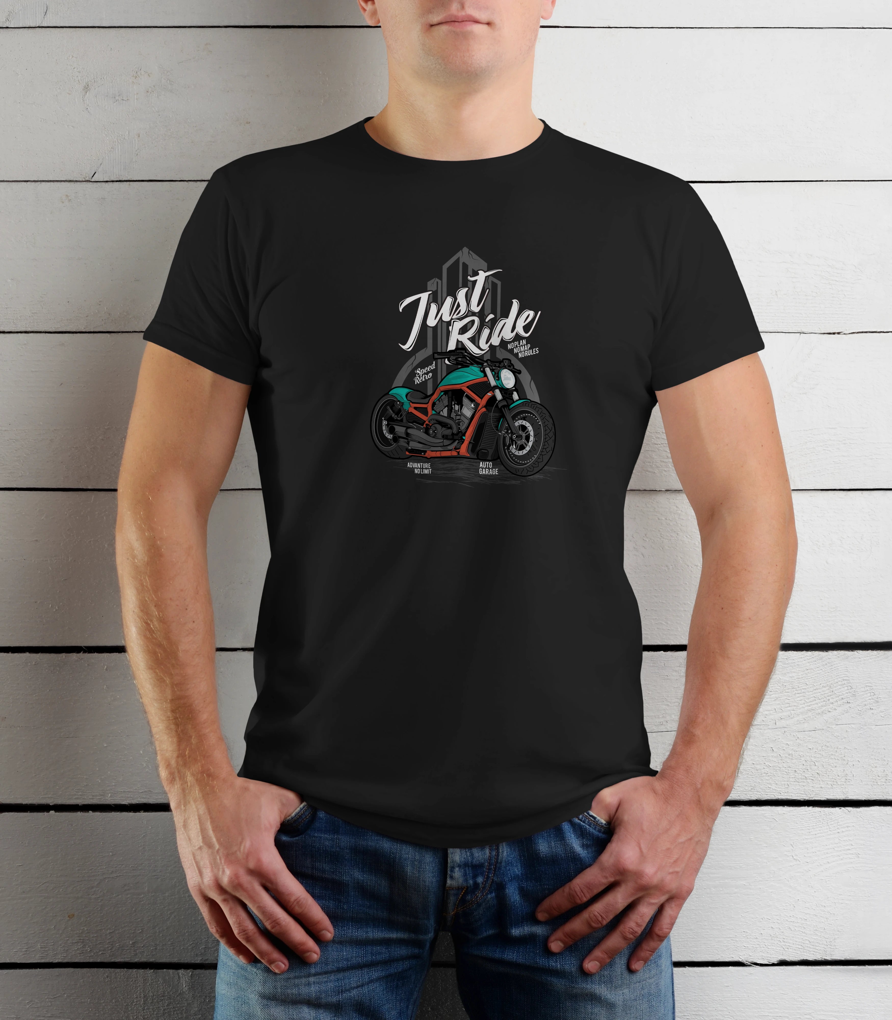 Person wearing a black t-shirt with a motorcycle graphic and 'Just Ride' text against a wooden background