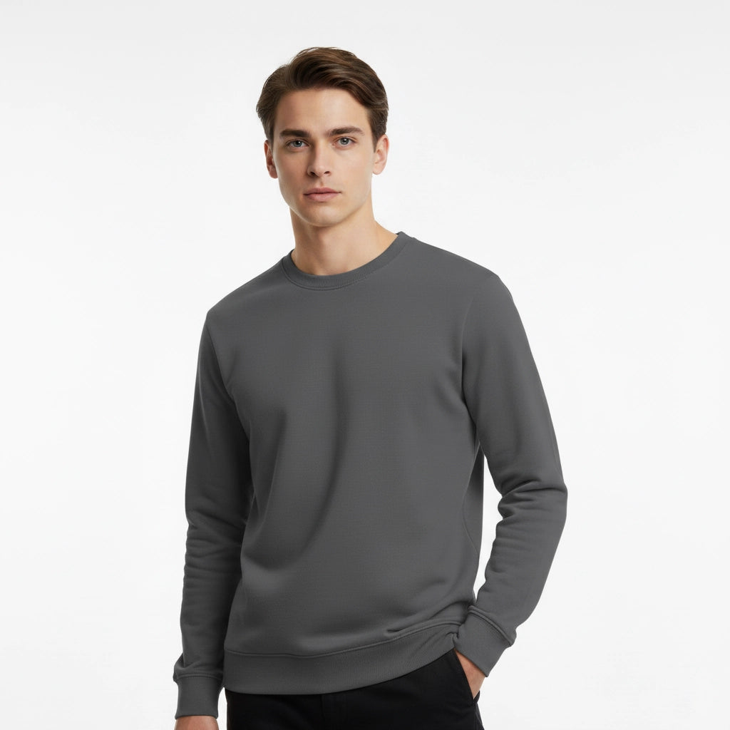 Man wearing a gray sweatshirt on a white background