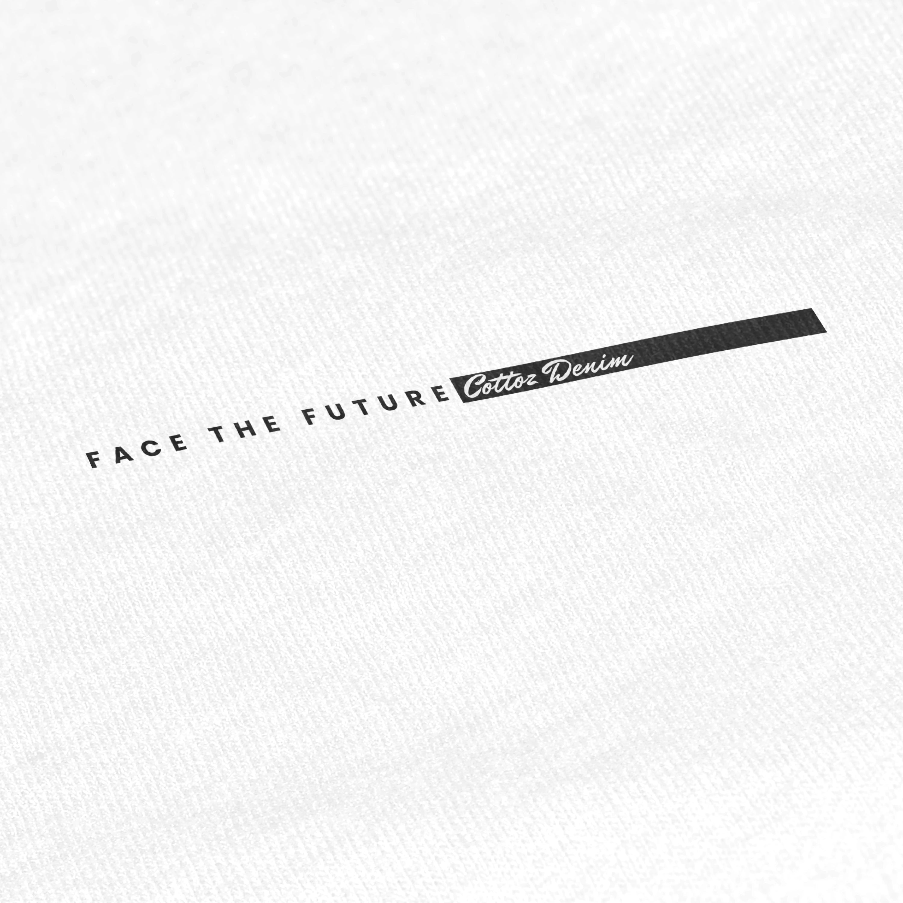 Text 'FACE THE FUTURE Cotton Denim' on a white denim fabric background