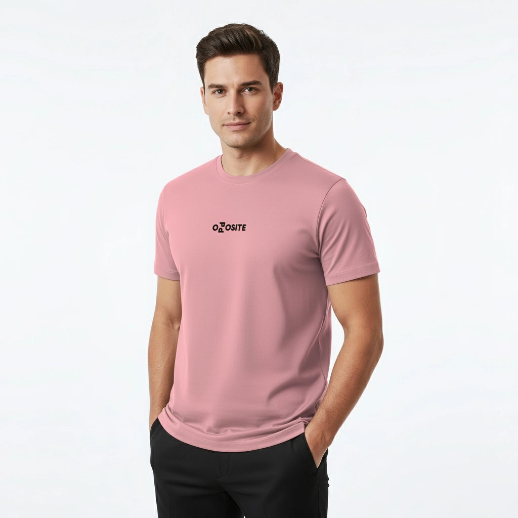 Man wearing a pink t-shirt with a logo on a white background
