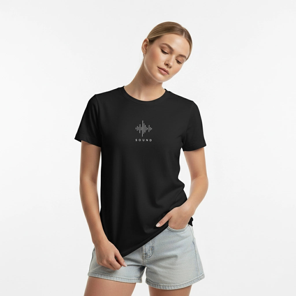 Woman wearing a black t-shirt with a white graphic design on a white background